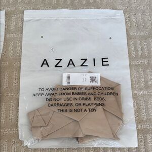 Azazie stretch satin sash in Champagne